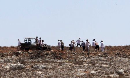Settlers assault Asira al-Qibliya, injure a farmer in the head